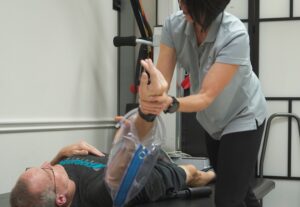 image of therapist working with a stroke survivor