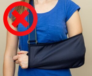 female with arm in a sling