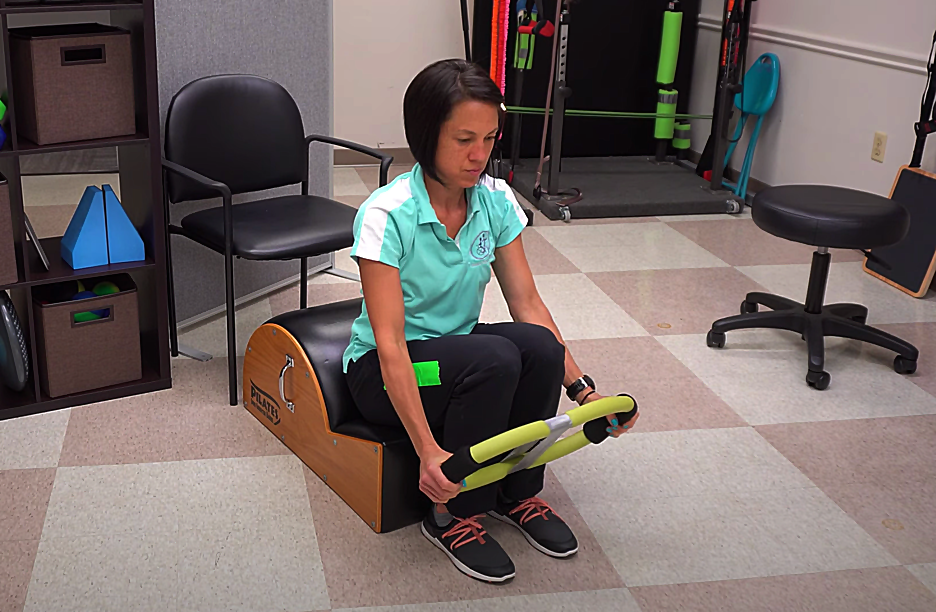 squatting arm raise