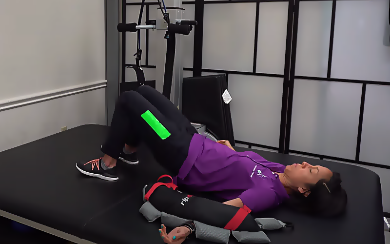 bridging exercise with arm blocked